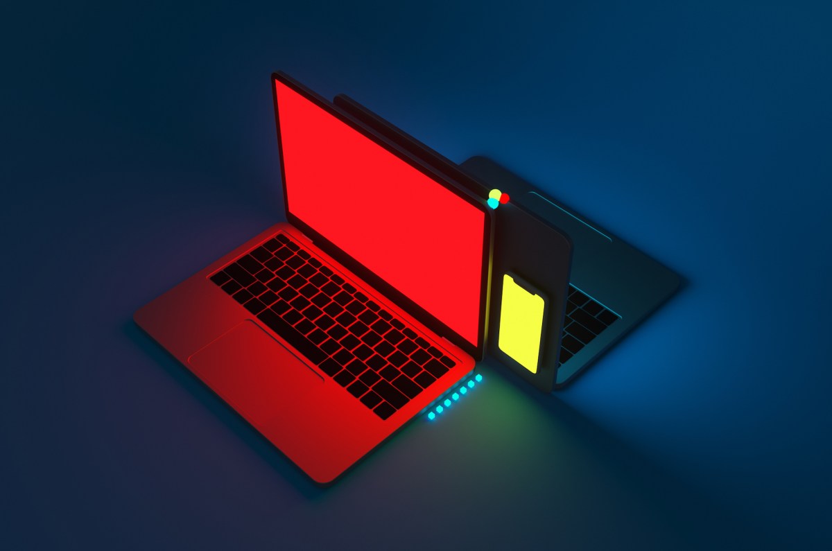 A red laptop on a blue background.