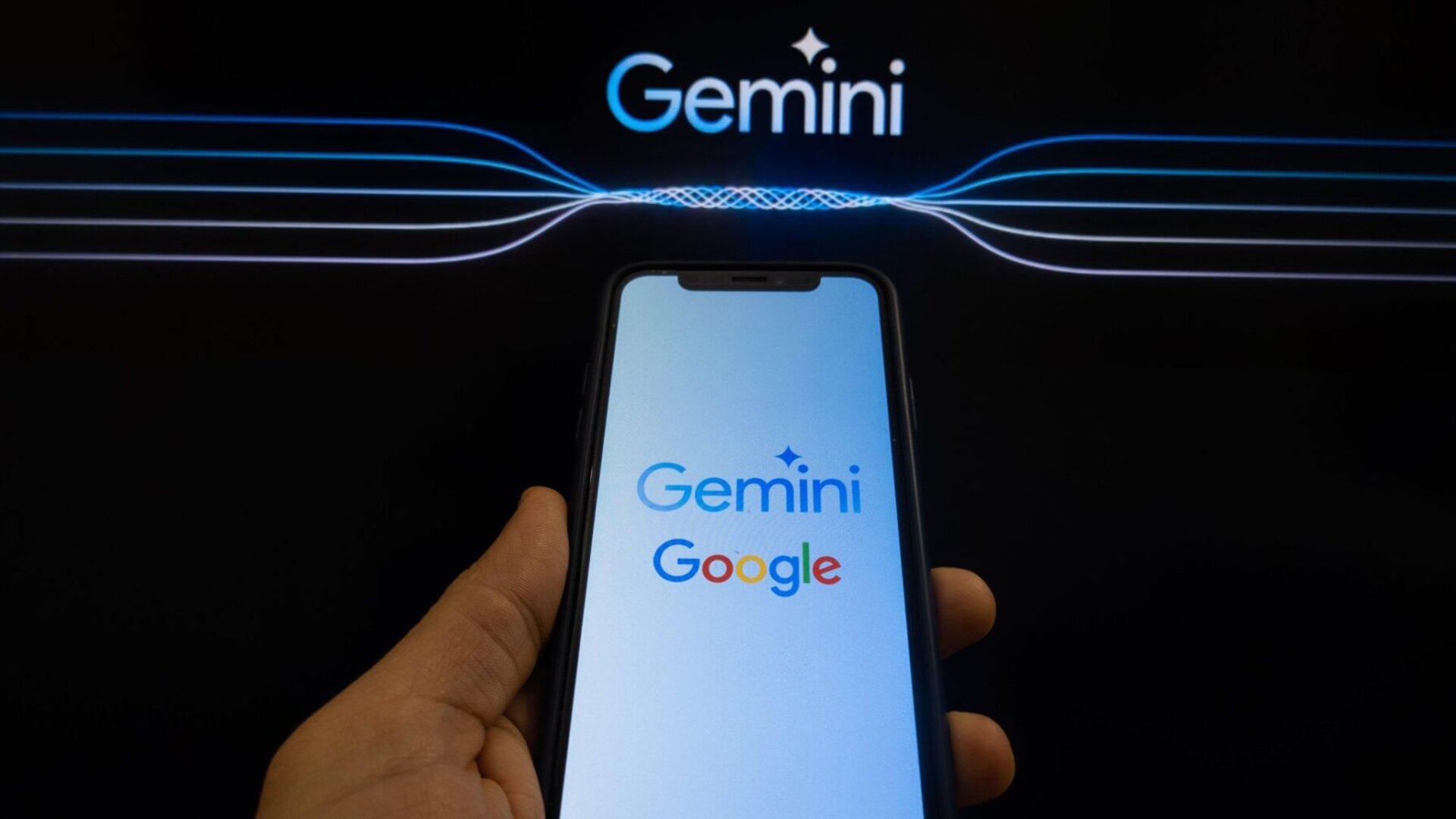 Google and Gemini logo appearing on a smartphone