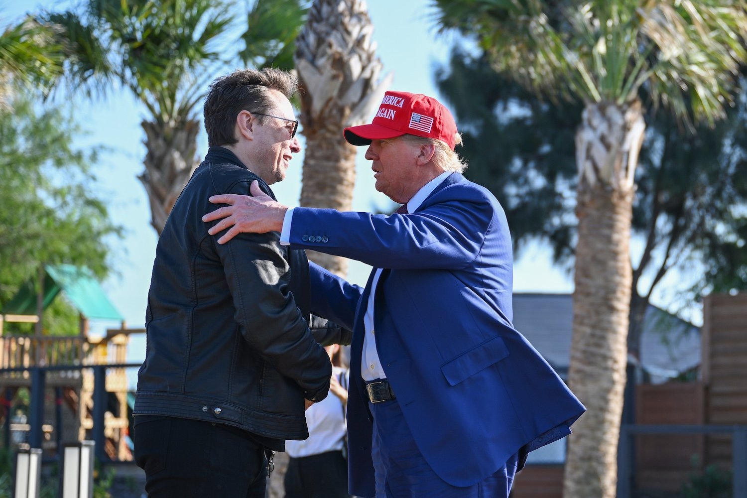 Donald Trump greets Elon Musk