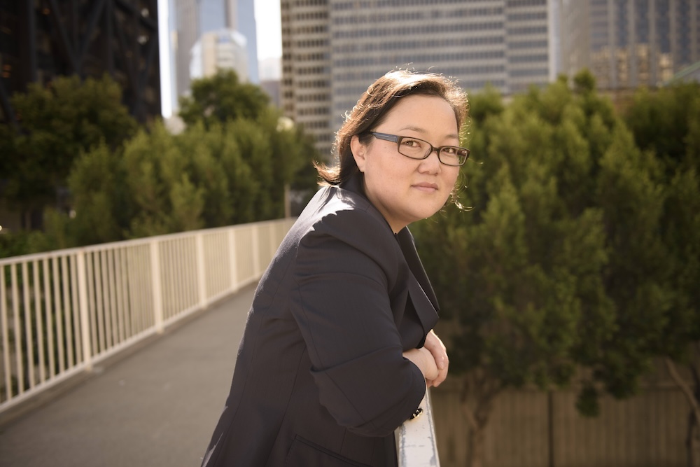 Photo of Tammy H. Nam on a bridge