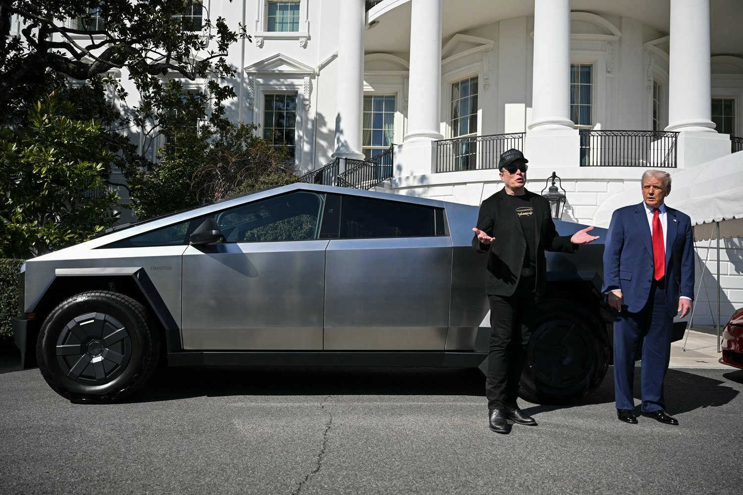 Us Politics Trump Tesla