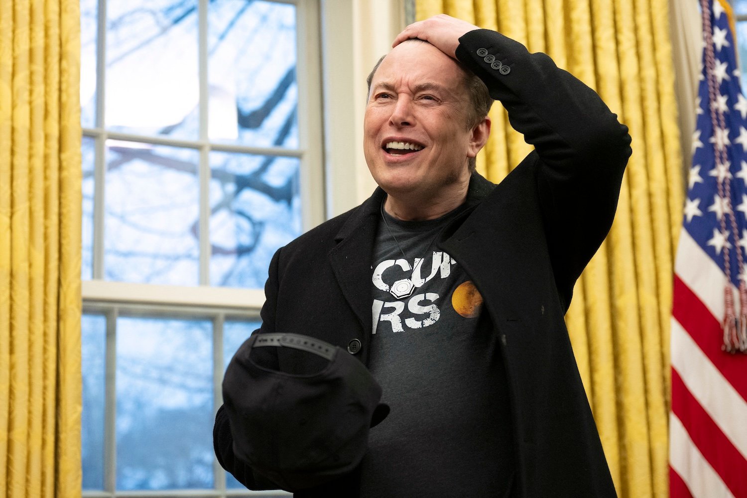 Elon Musk speaks in the Oval Office of the White House in Washington, DC, on February 11, 2025.