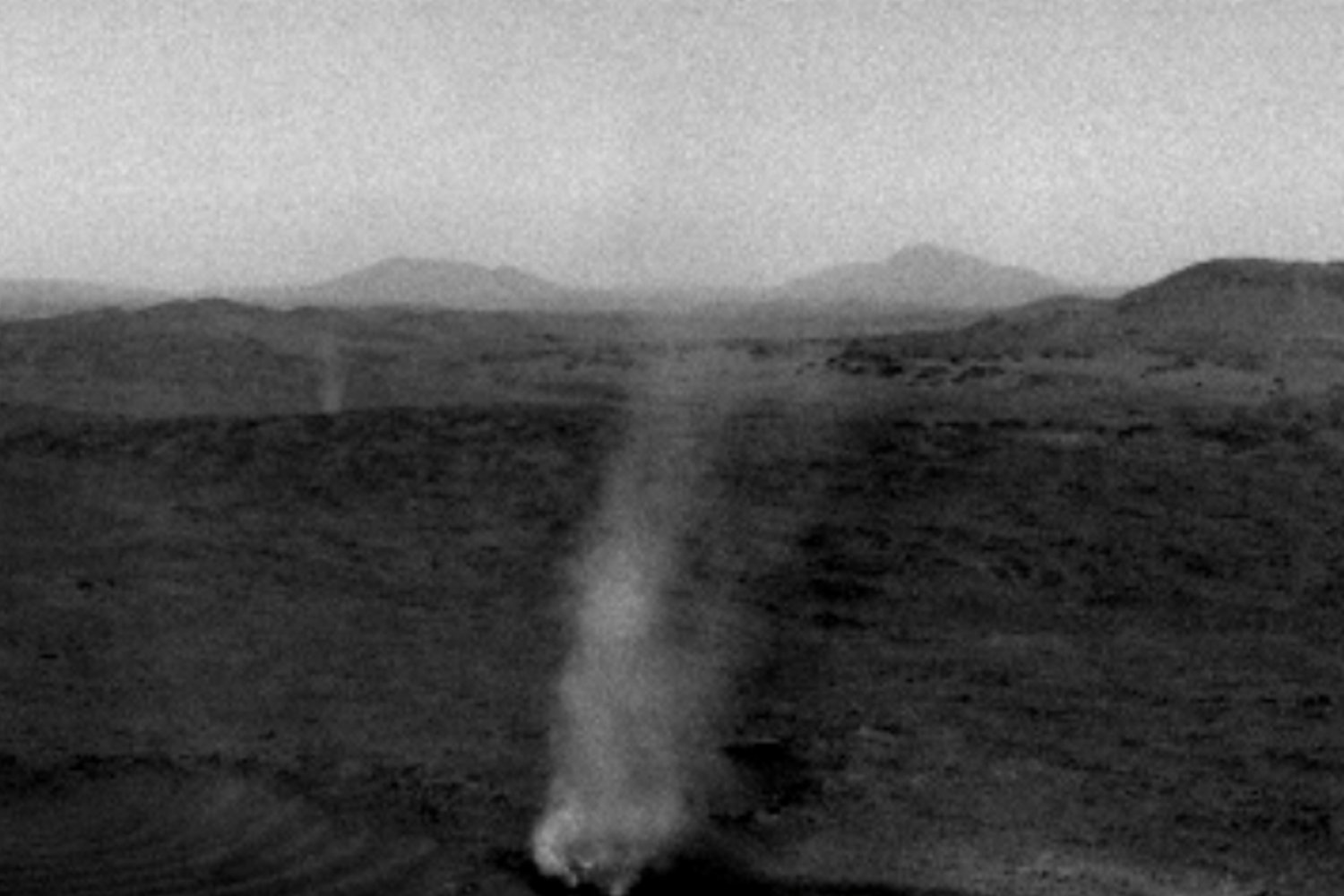 The Martian dust devil caught in the act at the rim of Jezero Crater.